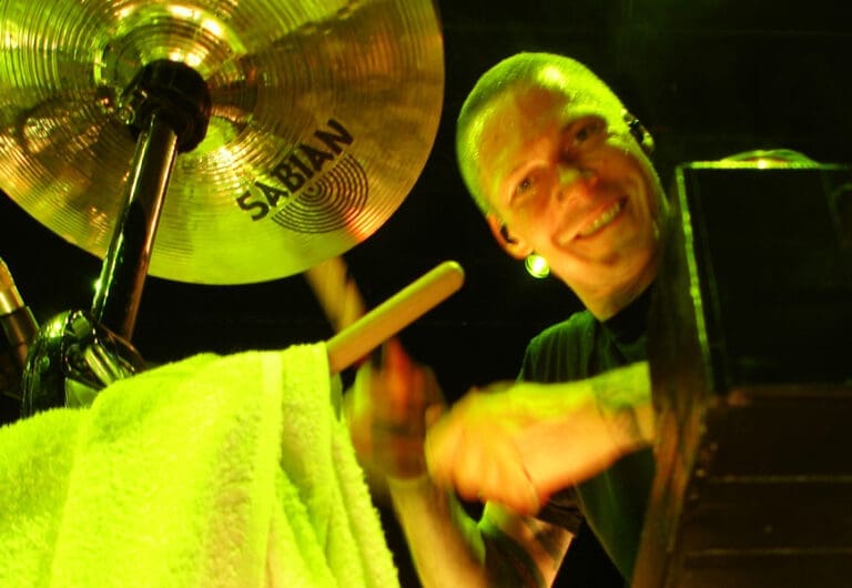 Aaron Solowoniuk on drums