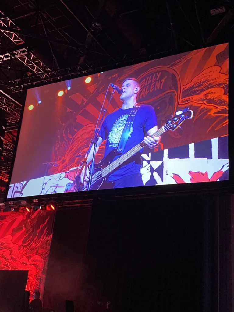 Jon Gallant from Billy Talent wearing FUMS shirt
