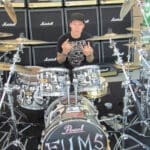 Aaron Solowoniuk behind a Pearl Drumset done by Stu Playdead