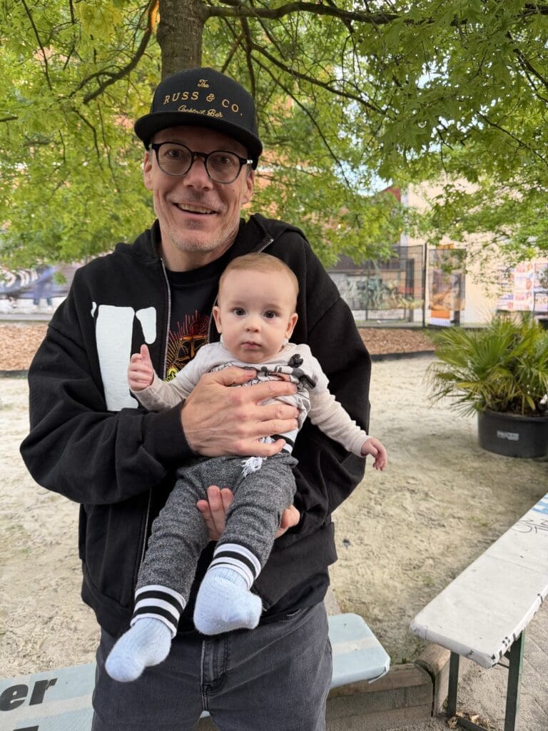 Aaron with a baby