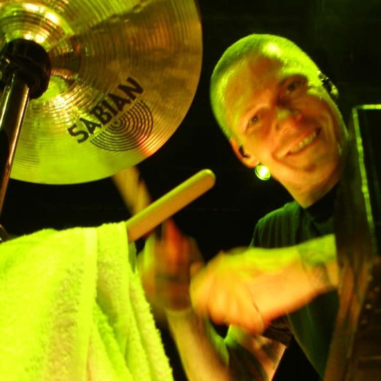 Aaron Solowoniuk on drums
