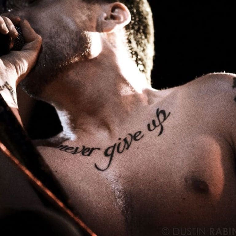 Ben Kowelwicz's tattoo "never give up"